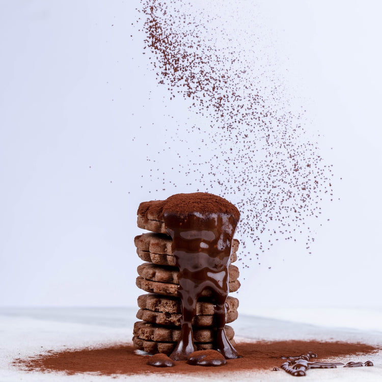Close-up of handcrafted Sablés with chocolate drizzle, styled for gourmet appeal