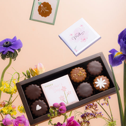 Luxury Love Sablé Box – Premium chocolate-coated sablés spelling “LOVE MOM,” an exquisite edible gift for celebrating motherhood.