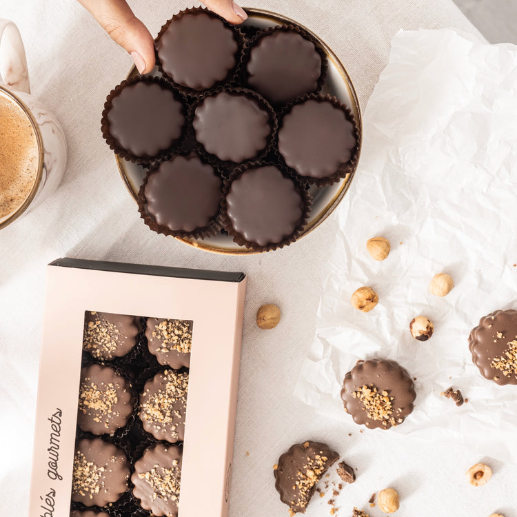 A close-up of gourmet Sablés paired with a rich shot of espresso for indulgent moments