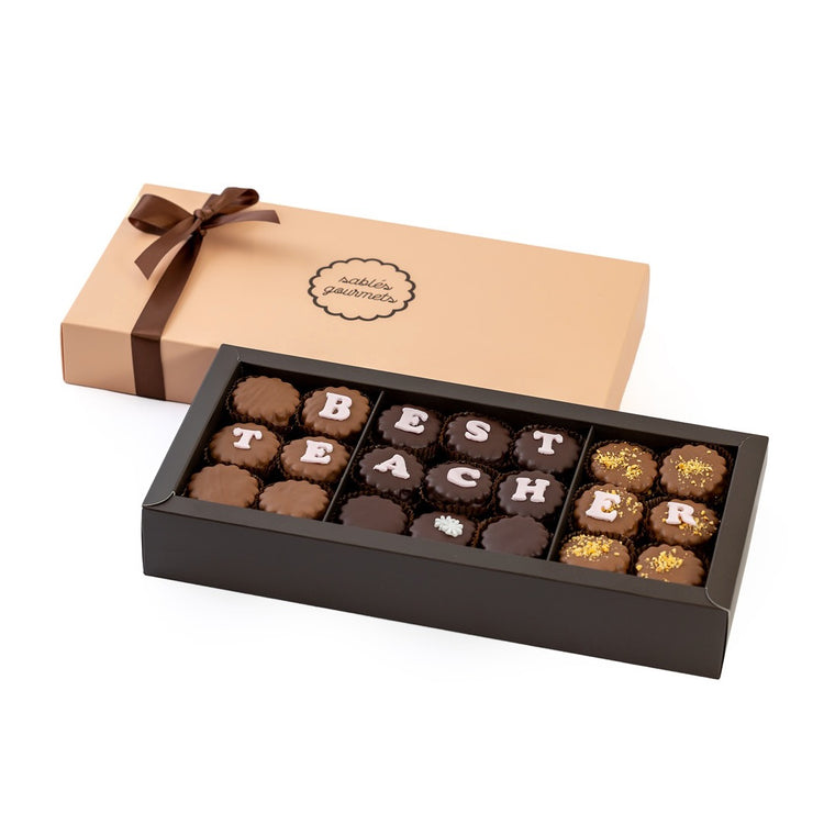 Elegant Teacher’s Day chocolate gift box featuring handcrafted Sablés, praline-filled treats, and a ‘Best Teacher Ever’ printed chocolate.