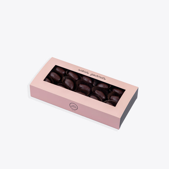 Rich dates coated in smooth dark chocolate, handcrafted for a luxurious treat