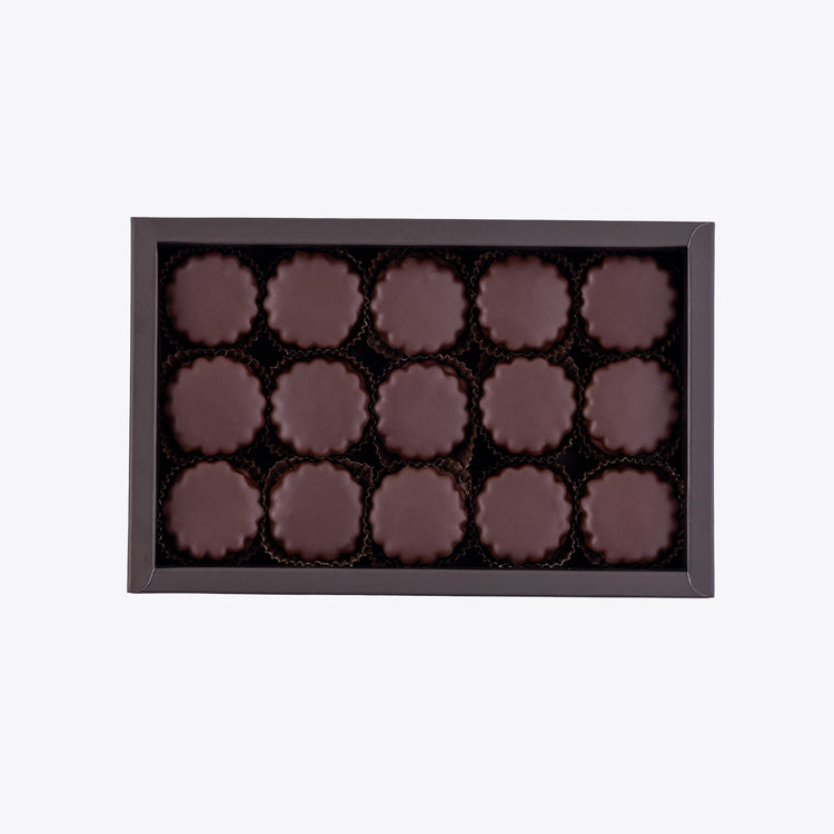 A grand assortment of handcrafted dark chocolate Sablés