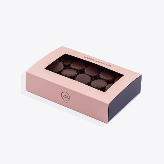 A premium selection of handcrafted dark chocolate Sablés, packaged for gifting