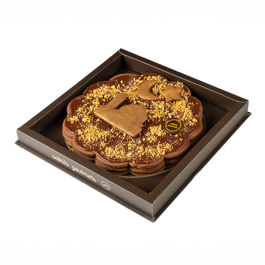 Chocolate tart with in a box on a white background