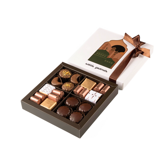 Box of chocolates with a brown ribbon on a white background