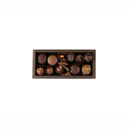 Box of assorted chocolates on a white background