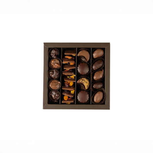 Box of assorted chocolates on a white background