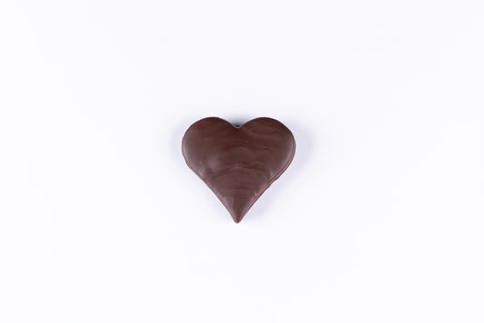 Chocolate heart on a white background