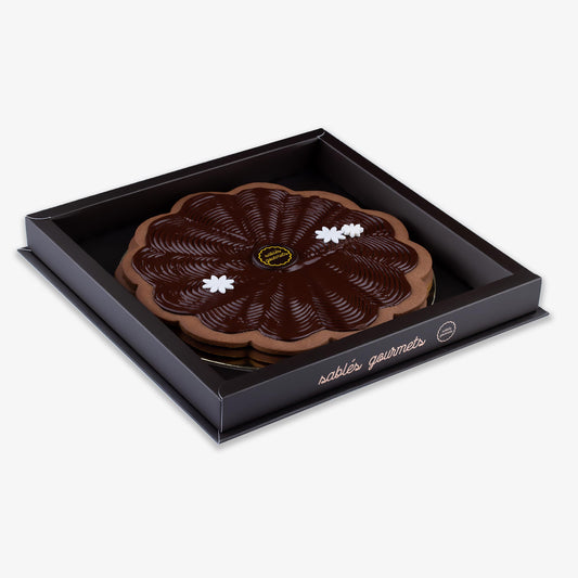 A rich dark chocolate tart with a buttery Sablé crust, handcrafted for indulgence