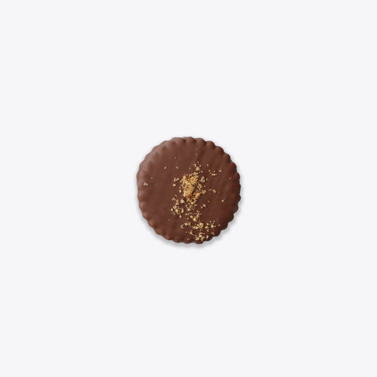 A rich Sablé filled with hazelnut cream and coated in smooth chocolate, perfect for nut lovers