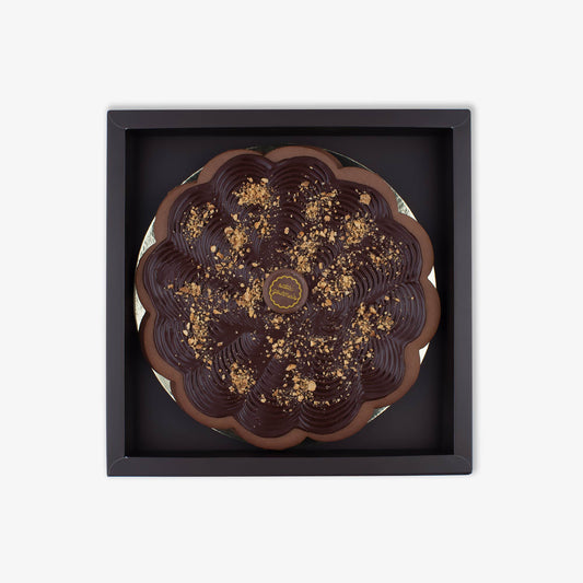 Handcrafted hazelnut tart with a buttery Sablé base, perfect for gifting or indulgence