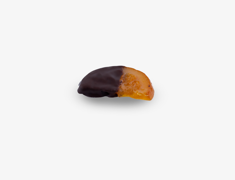 A handcrafted Quartier d’Orange, a luxurious blend of tangy orange and chocolate.